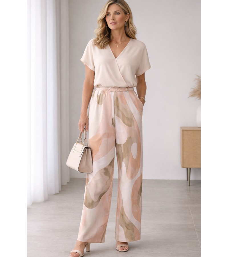 Pantalón largo bolsillos pata ancha estampado tonos pastel