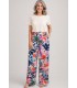 Pantalón largo bolsillos pata ancha estampado flores